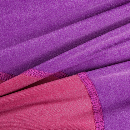Close-up of purple and pink fabric with a textured pattern