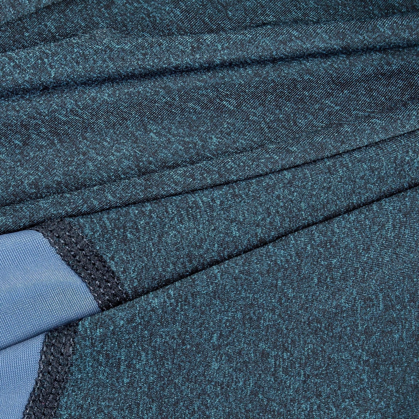 Close-up of textured blue fabric with a focus on pattern and color.