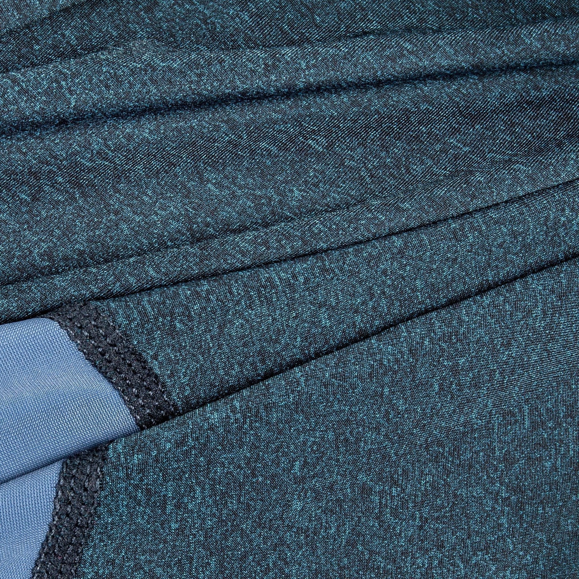 Close-up of textured blue fabric with a focus on pattern and color.
