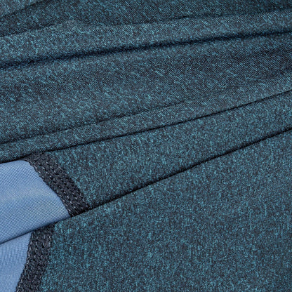 Close-up of textured blue fabric with a focus on pattern and color.