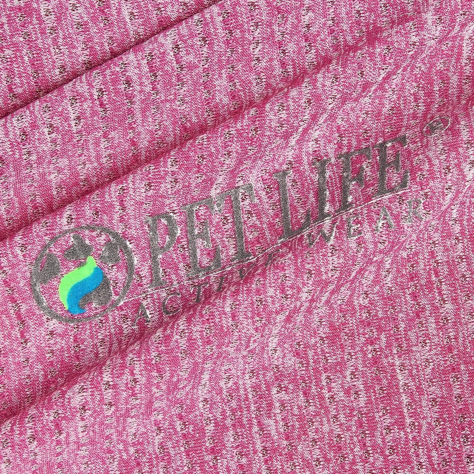 Close-up of pink textured fabric with 'PET LIFE' logo.
