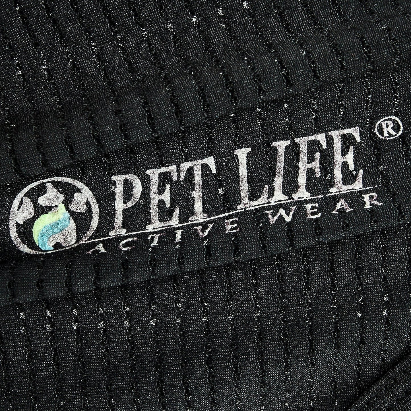 Close-up of a black pet garment with 'Pet Life Active Wear' logo.