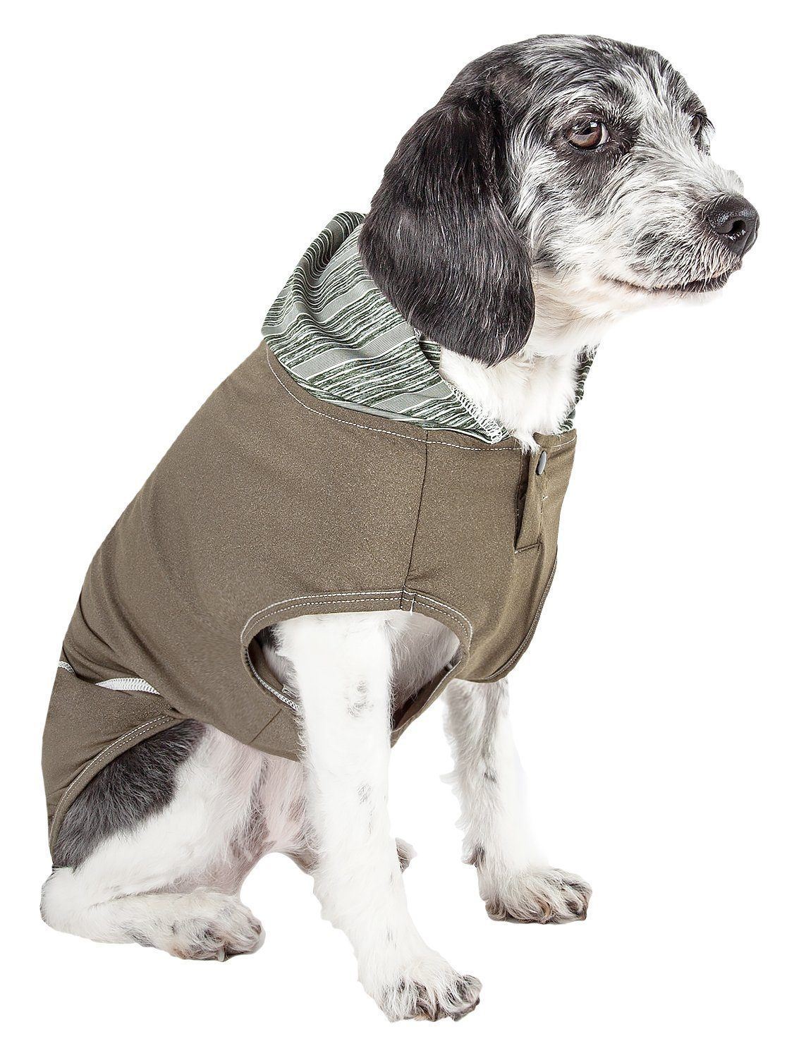 Dog wearing a brown fleece vest on a white background