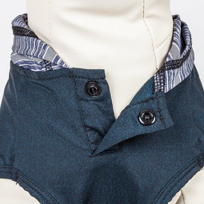 Blue jacket with patterned lining on a mannequin against a white background