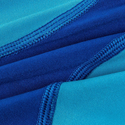 Close-up of blue fabric with zipper details