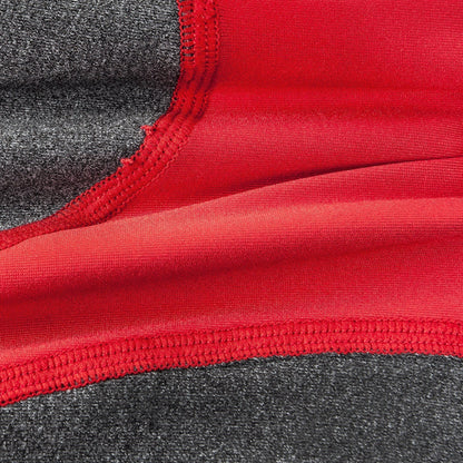 Close-up of red and gray fabric with a visible seam
