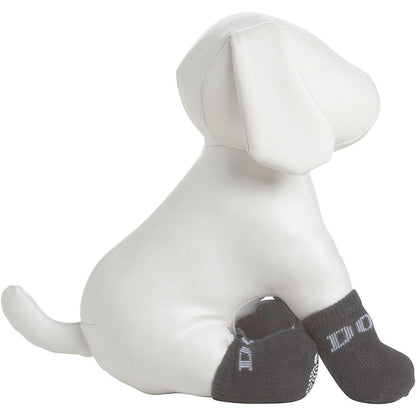 White dog-shaped pillow with gray socks on a white background