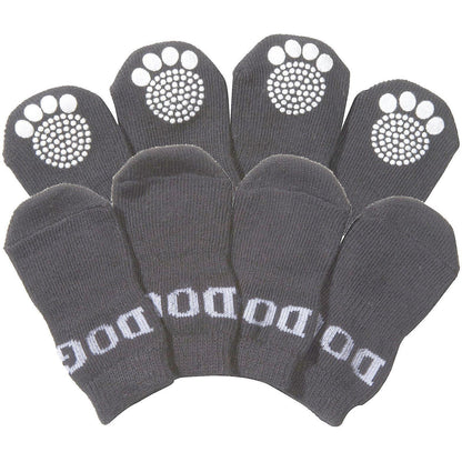 Set of gray dog socks with paw pattern on a white background