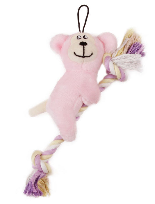Pink monkey plush toy with a rope on a white background