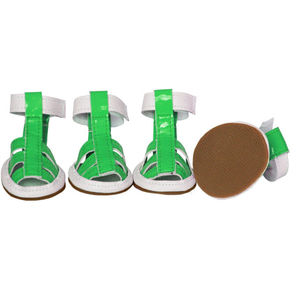 Green sandals with white straps on a white background