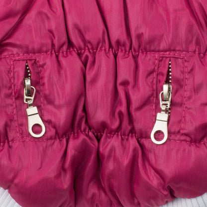 Close-up of a pink puffer jacket with zippers on a white background