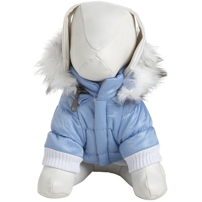 Stuffed animal in a blue winter outfit with a white hood on a white background