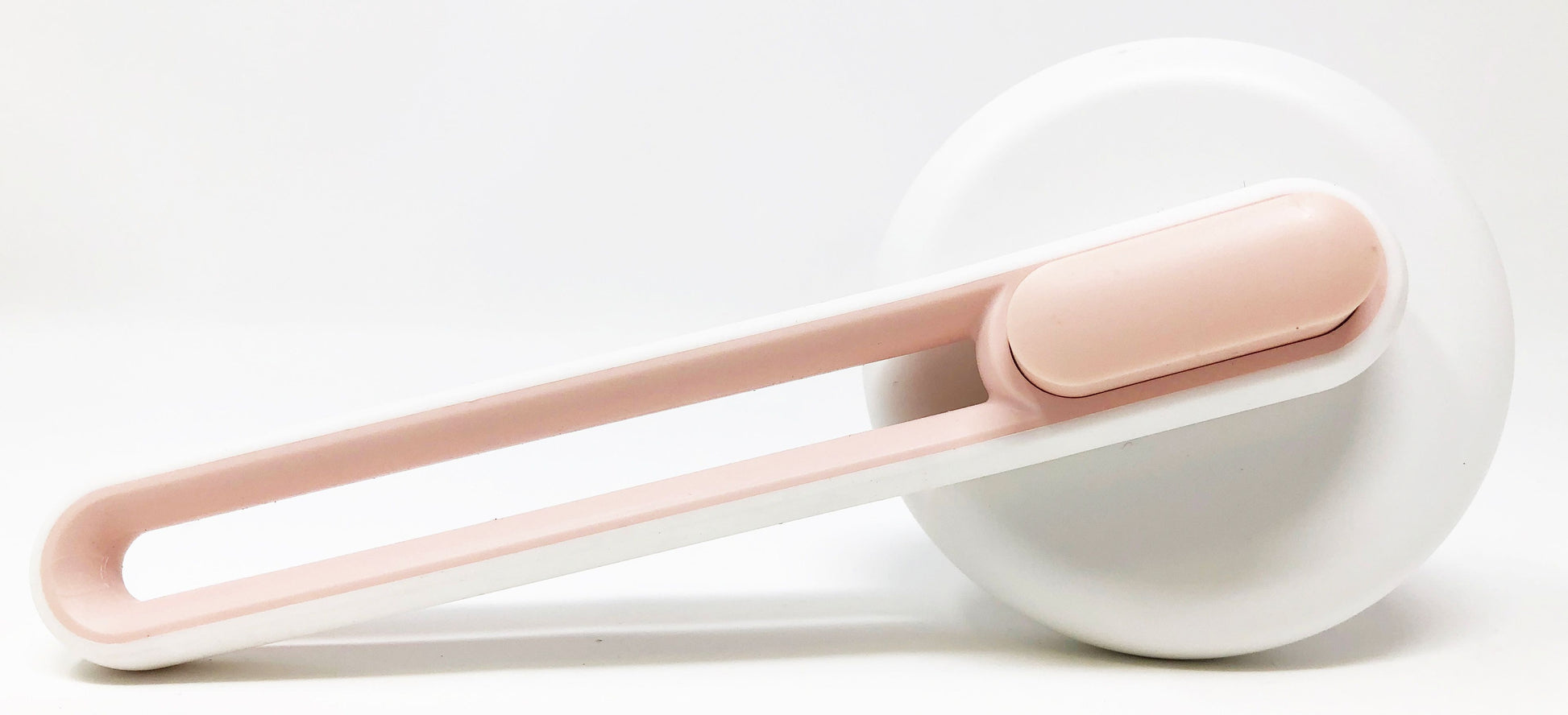 White and pink hair tie on a white background
