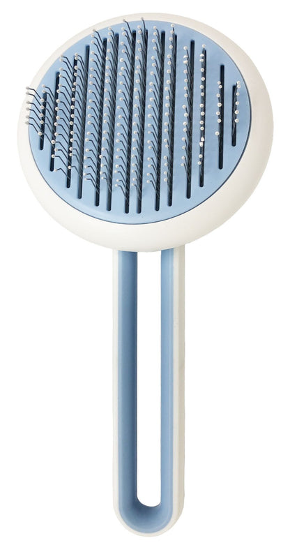 Blue and white pet grooming brush on a white background