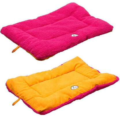 Two pink and orange pet beds on a white background
