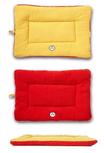 Three rectangular cushions in yellow, red, and a combination of both on a white background.