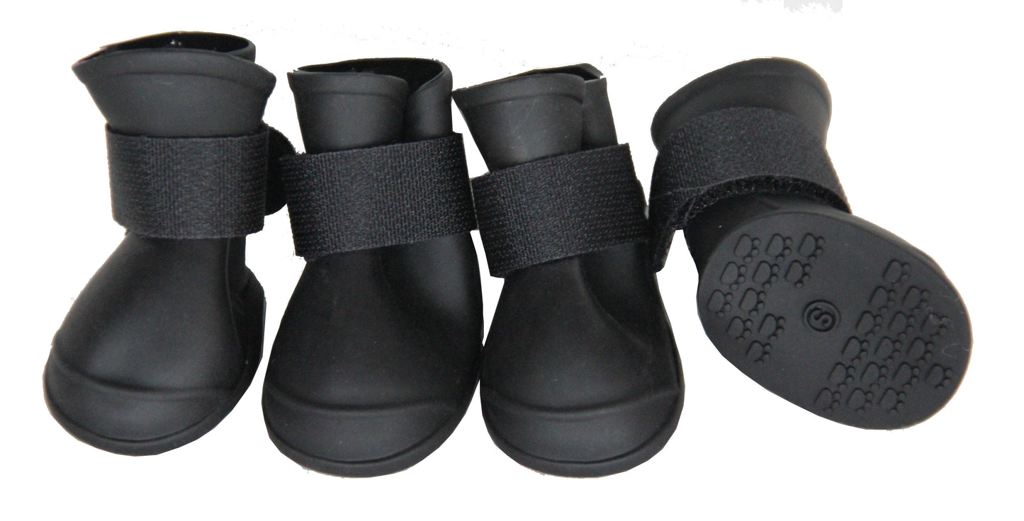 Four black pet boots with straps on a white background