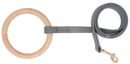 Dog leash with wooden ring handle on a white background