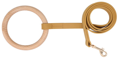 Dog leash with wooden rings on a white background