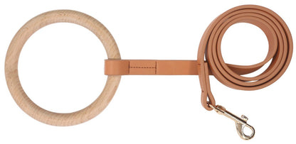 Brown leather dog leash with circular handle on a white background