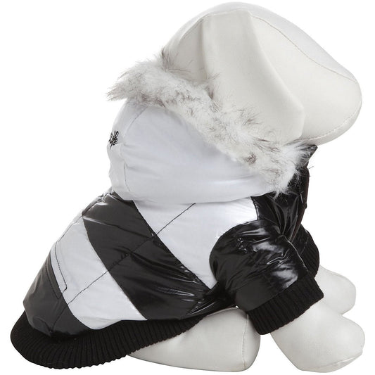 White and black winter coat with fur-lined hood on a mannequin against a white background