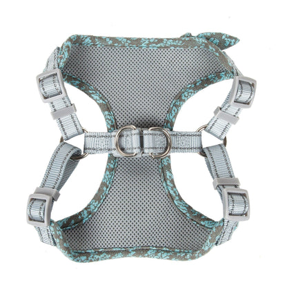 Gray dog harness with floral pattern on a white background