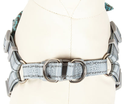 Silver dog collar with decorative elements on a mannequin head.