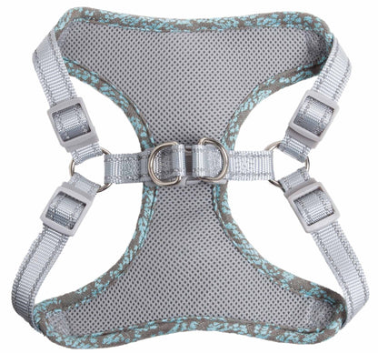 Gray dog harness with floral pattern on a white background