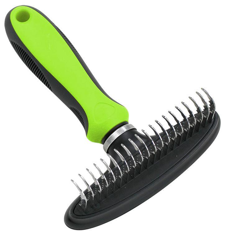 Pet grooming brush with green handle and metal bristles on a white background
