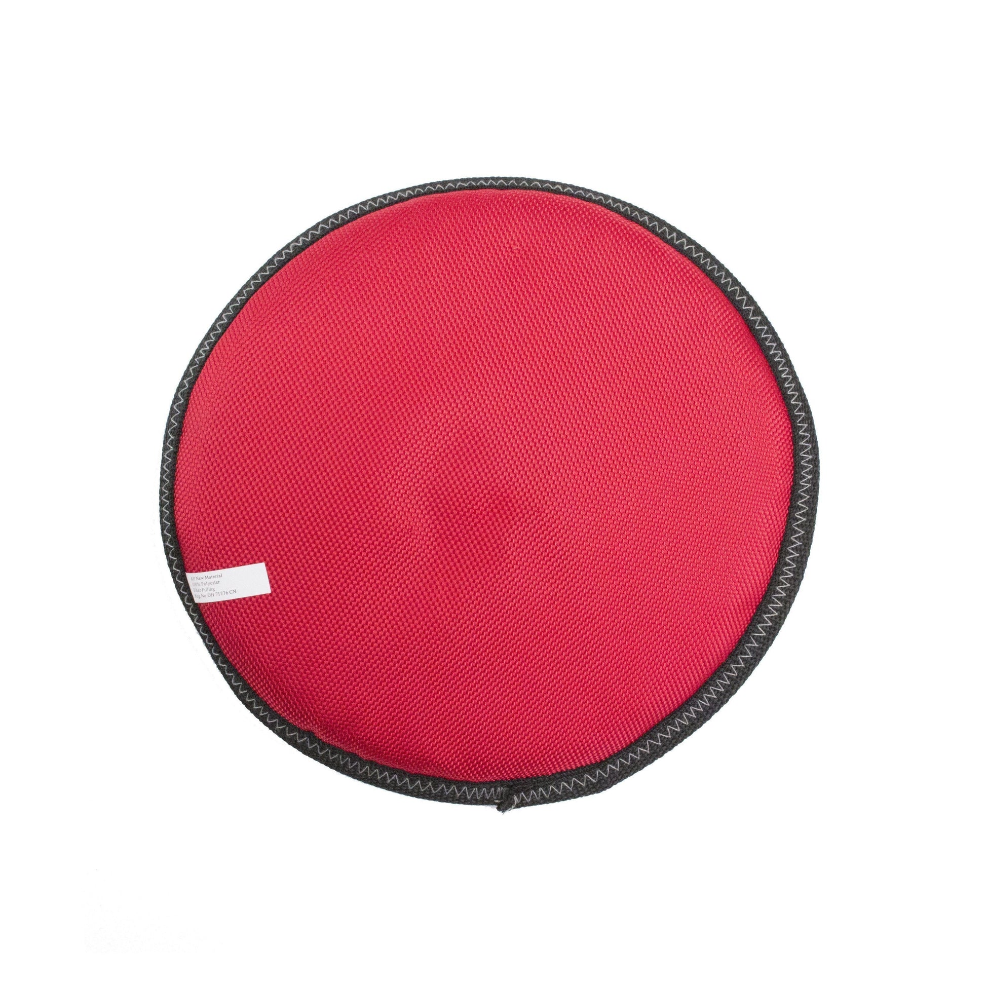 Red round object with black border on a white background