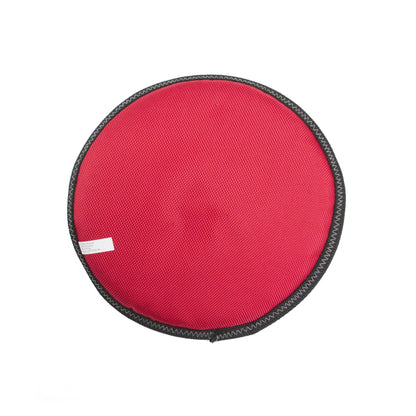 Red round object with black border on a white background