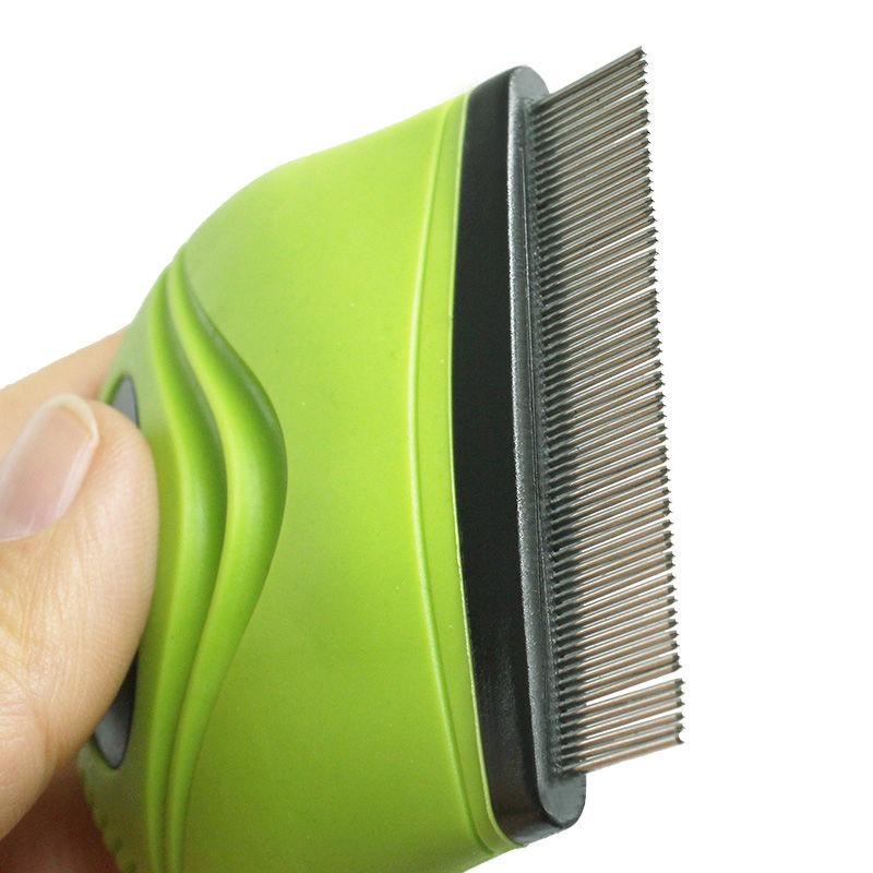 Green pet grooming brush with metal bristles on a white background