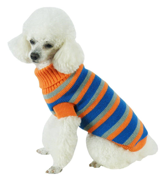 White dog wearing an orange, blue, and gray striped sweater on a white background