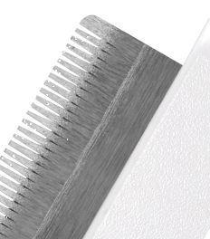 Metallic comb on a white background