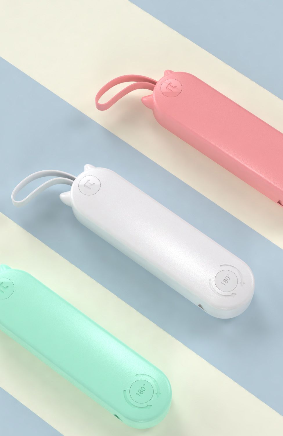 Three colorful portable devices on a multicolored background