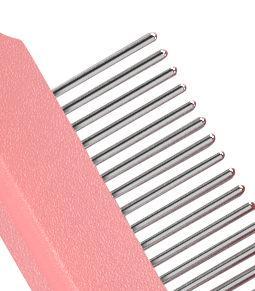 Pink hairbrush with metal bristles on a white background