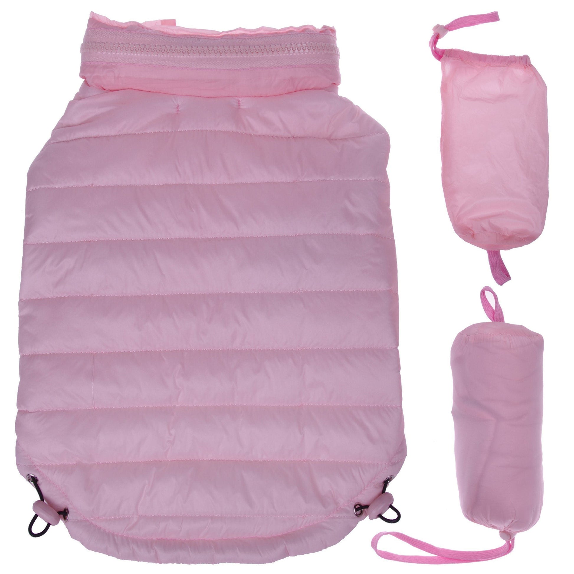 Pink sleeping bag with compression sack on a white background