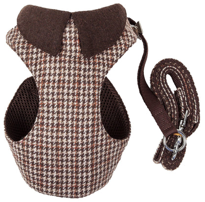 Houndstooth patterned dog harness and leash set on a white background