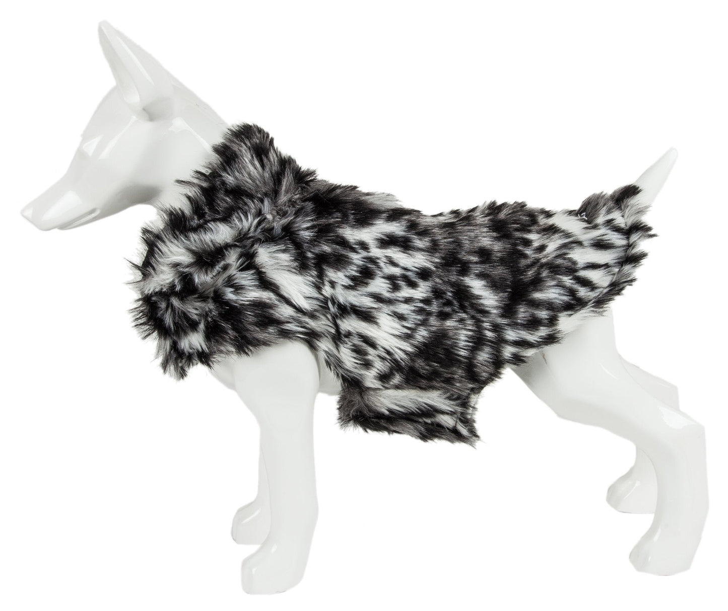 Dog mannequin wearing a black and white fur coat on a white background