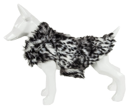 Dog mannequin wearing a black and white fur coat on a white background