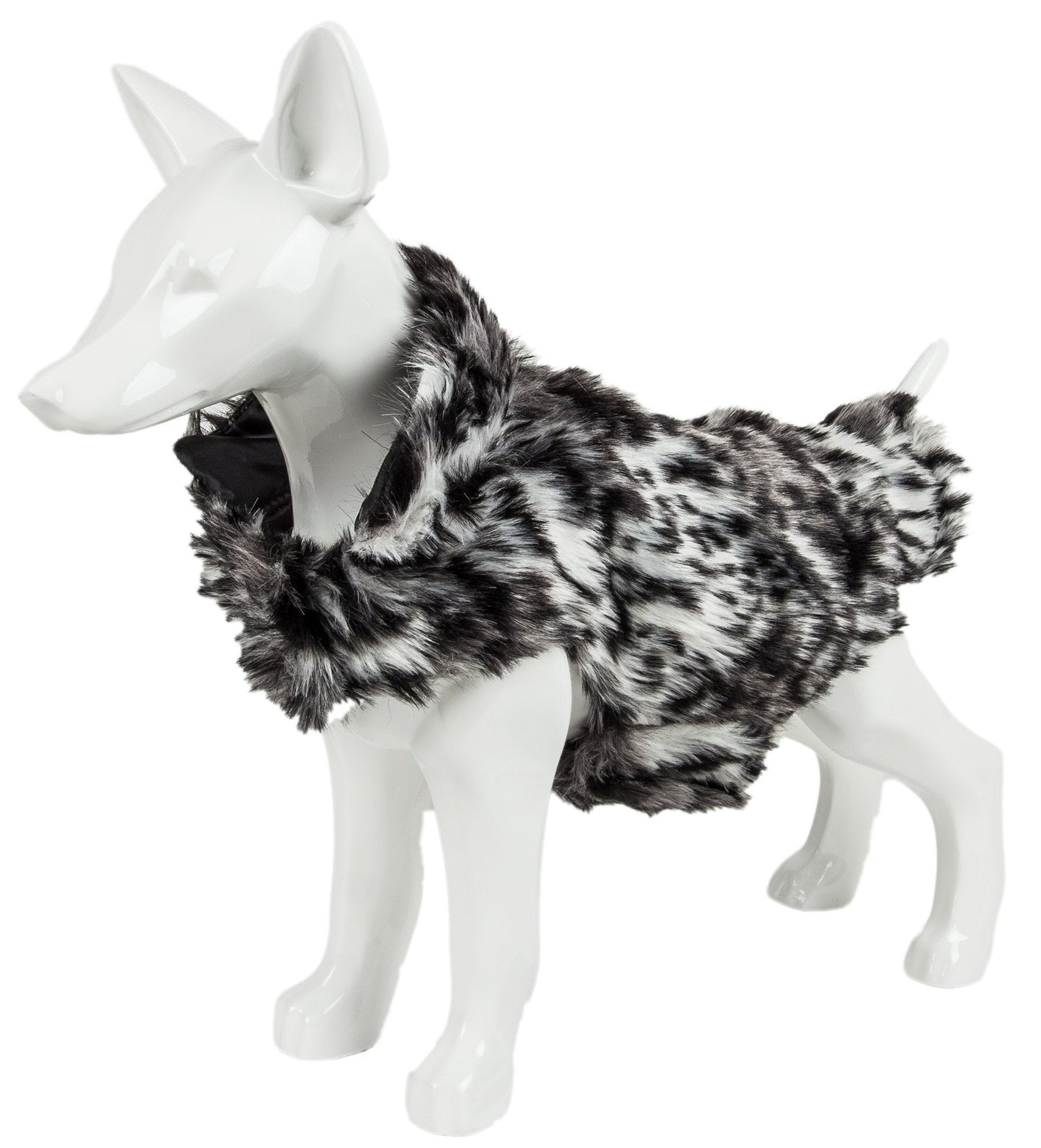 Mannequin wearing a black and white fur coat on a white background