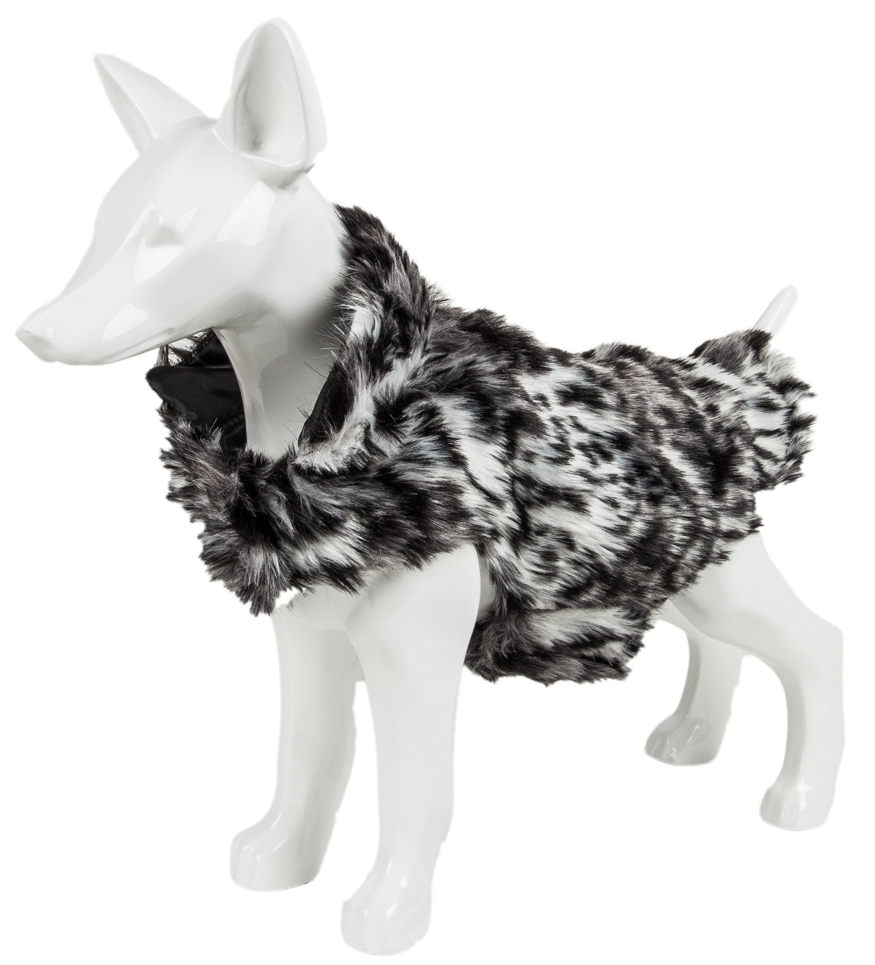 Mannequin wearing a black and white fur coat on a white background