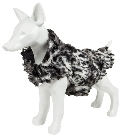Mannequin wearing a black and white fur coat on a white background