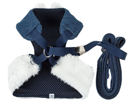 Navy blue and white dog harness with matching leash on a white background