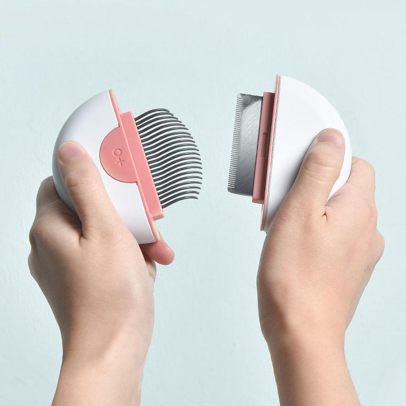 Two hands holding a pet grooming tool with a clear background