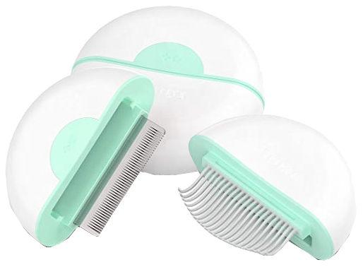 Two green and white pet grooming tools on a white background