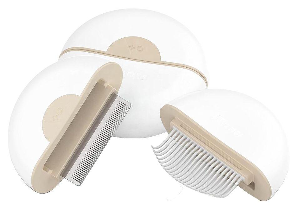 Pet grooming brush with clear handle and beige bristles on a white background