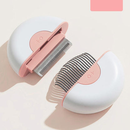 Pet grooming tool with pink and white design on a light background