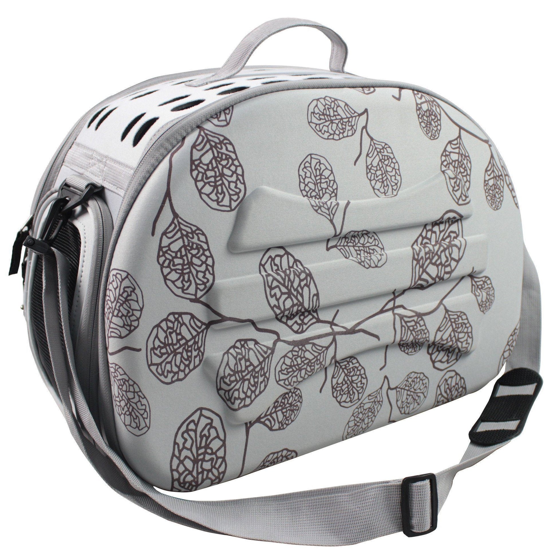 Round pet carrier with leaf pattern on a white background