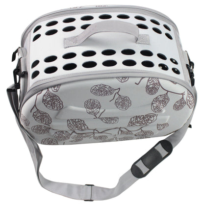 Pet carrier with floral pattern on a white background